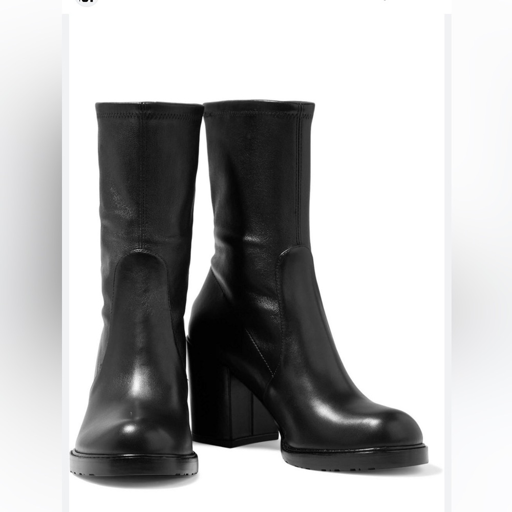 New In Box— never worn, calf-height. Past return window, have similar pair.